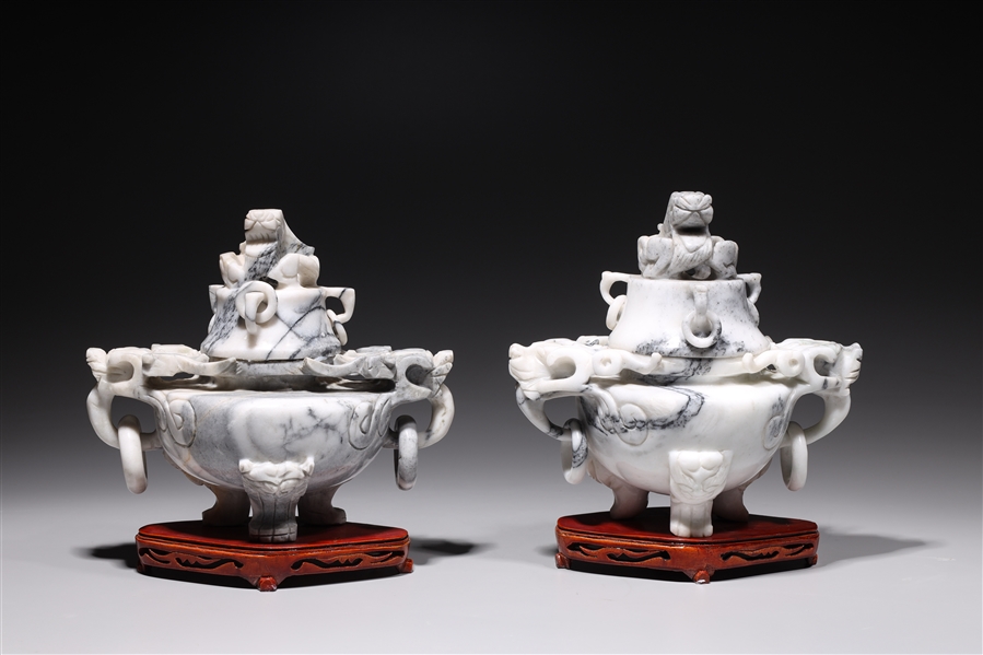 Appraisal: Pair of large carved stone covered censers each with wood