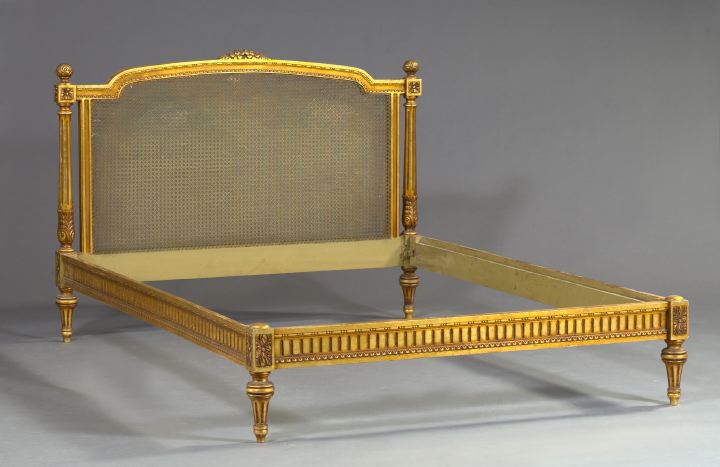 Appraisal: Louis XVI-Style Giltwood and Caned Bedstead the headboard with a