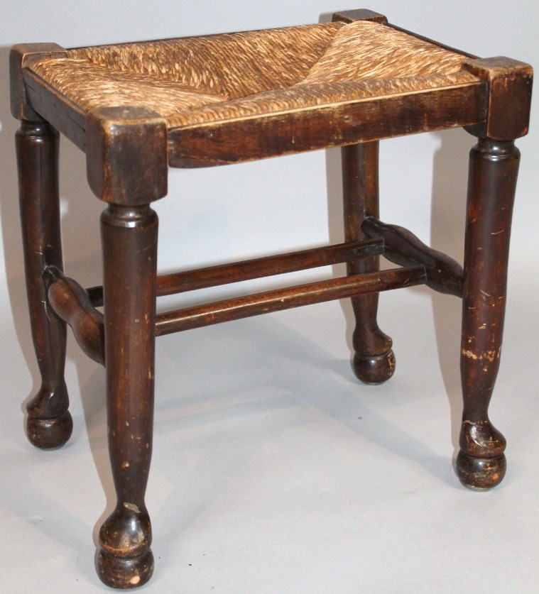 Appraisal: An early thC oak stool the rectangular top with a