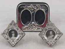 Appraisal: A pair of silver miniature crowned photo frames Birmingham cm