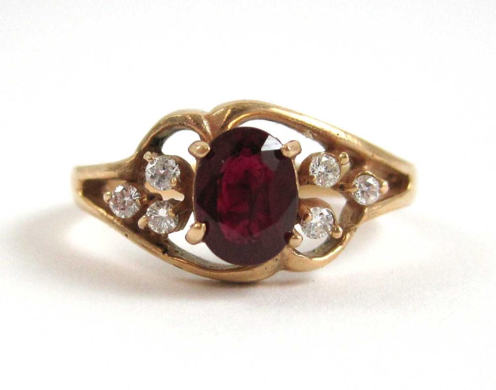 Appraisal: RUBY DIAMOND AND FOURTEEN KARAT GOLD RING with three round-cut