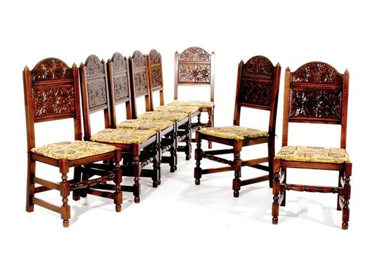 Appraisal: Eight Continental carved oak side chairs domed crest and carved