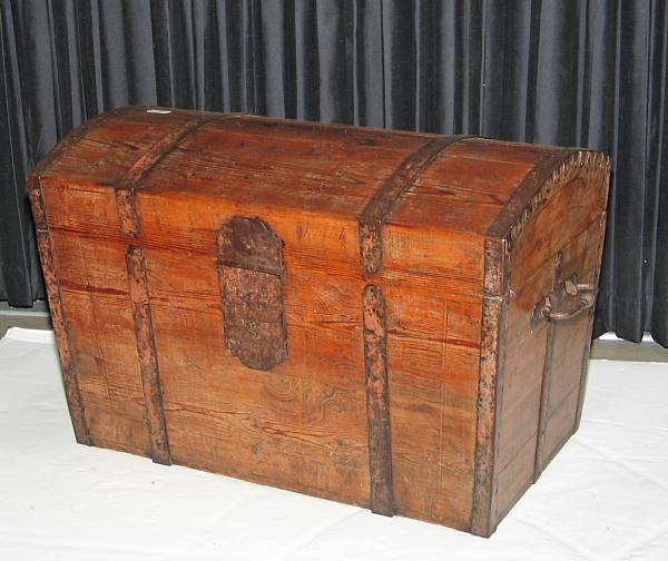 Appraisal: A Continental iron mounted stained pine domed chest late th