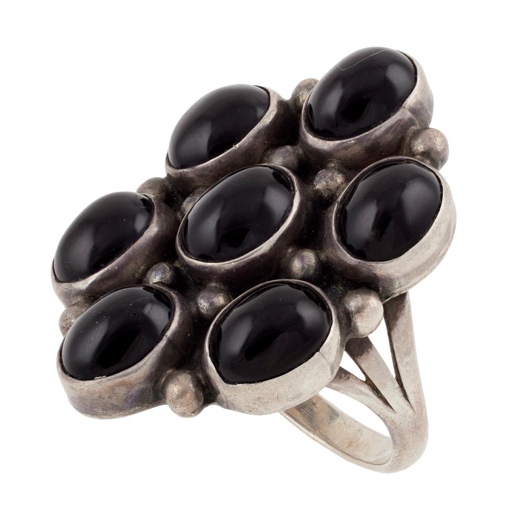 Appraisal: NAVAJO STERLING SILVER AND ONYX CLUSTER RING MID- TH CENTURY