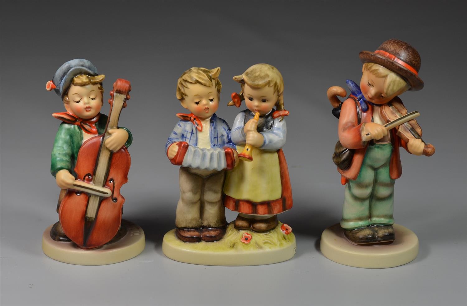 Appraisal: Goebel Hummel Figurines Birthday Serenade Little Fiddler Sweet Music all