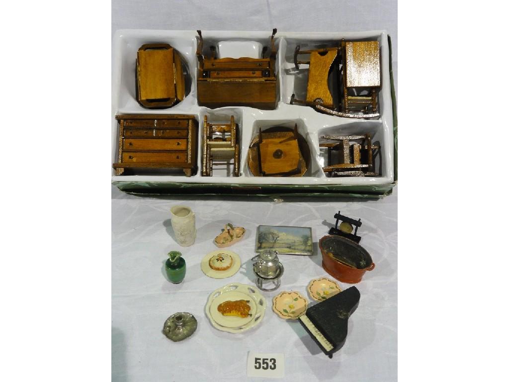 Appraisal: A boxed set of wooden miniature furniture in the English