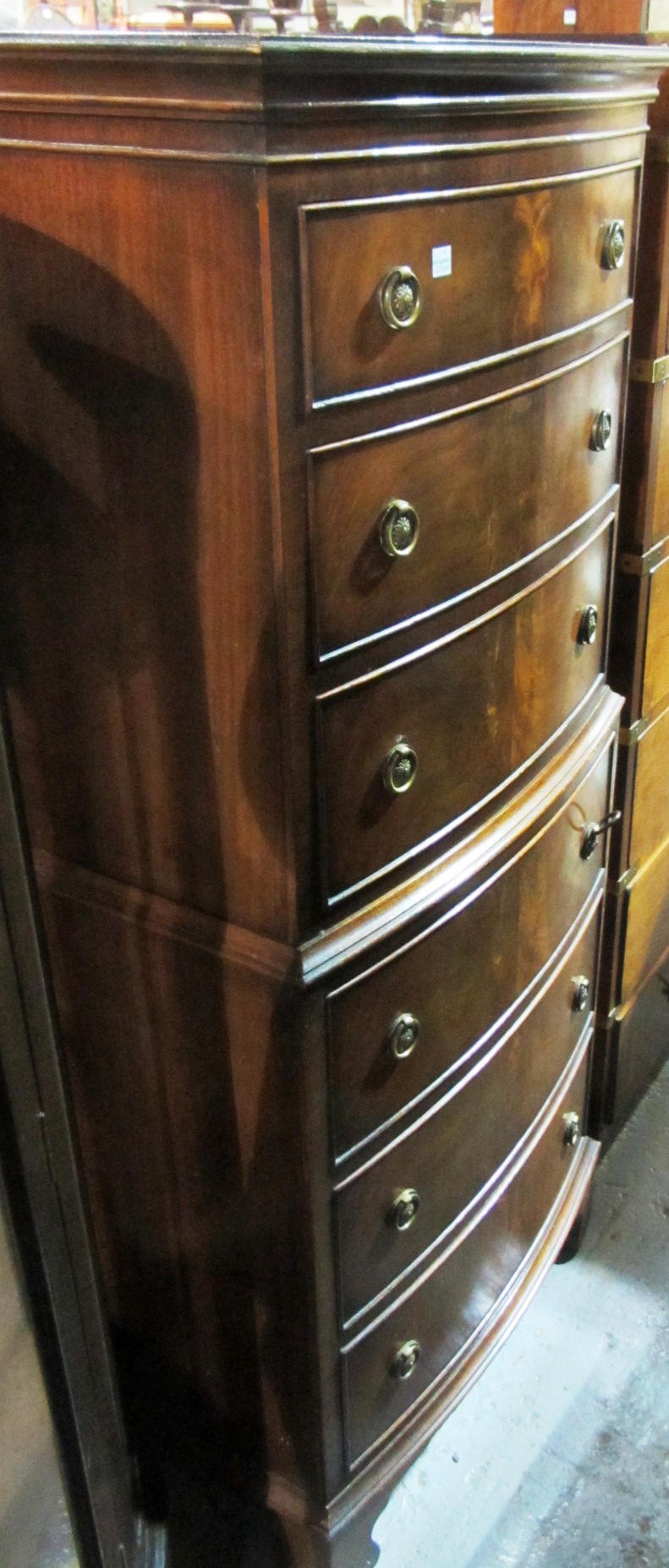 Appraisal: A th century mahogany small bowfront chest on chest