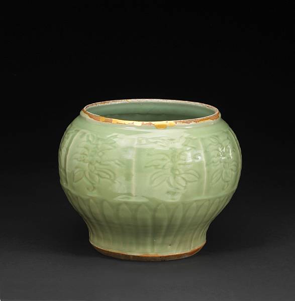 Appraisal: A Longquan celadon jar Ming Dynasty Of compressed globular form