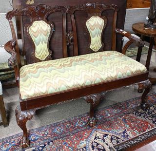 Appraisal: Queen Anne style settee executed in mahogany having a carved