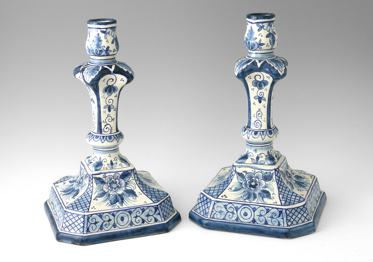 Appraisal: PAIR OF DELFT BLUE AND WHITE CANDLESTICKS Floral blue and