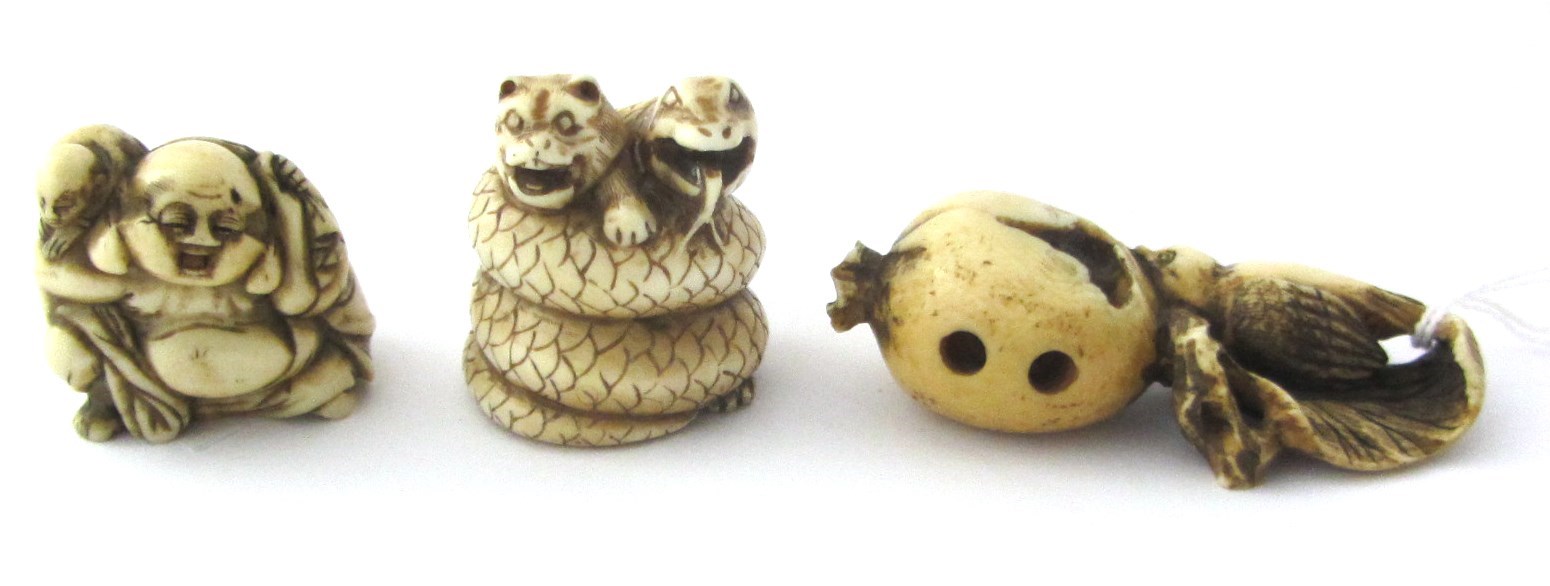 Appraisal: A Japanese ivory netsuke th century carved as a bird