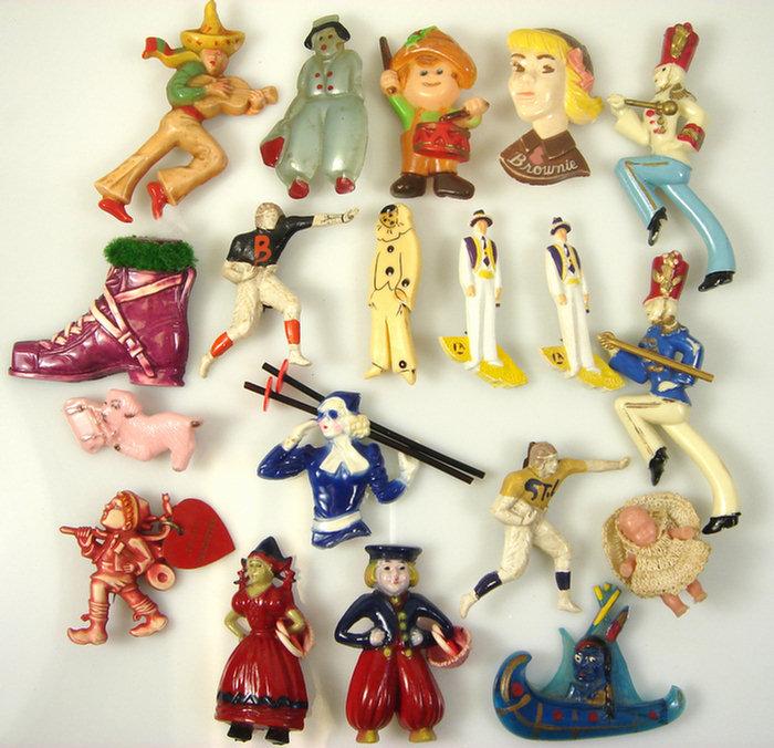 Appraisal: plastic other costume jewelry figural pins barettes drum majors football