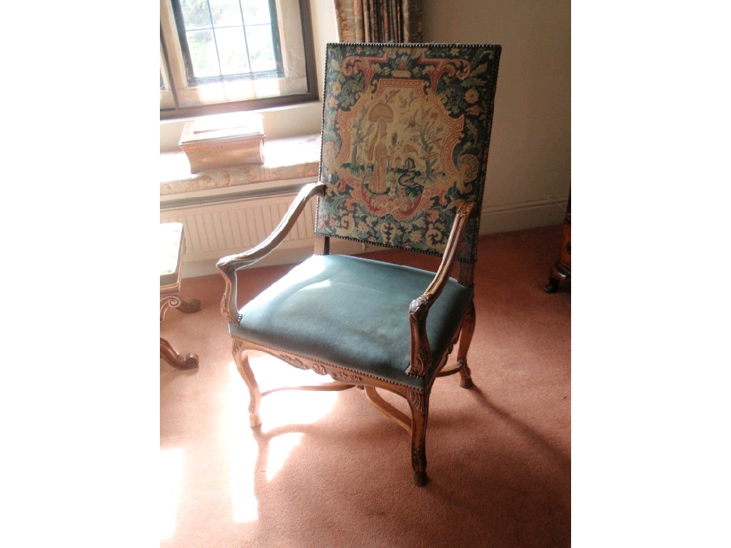 Appraisal: A thC walnut open armchair in thC style with tapestry