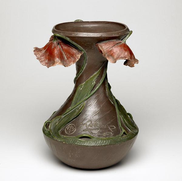 Appraisal: ART NOUVEAU Large earthenware vase with applied poppies by Korina