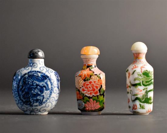 Appraisal: Three Porcelain Snuff Bottles in different shapes one with blue