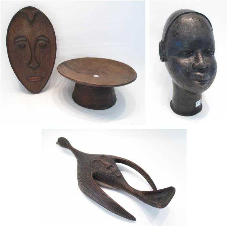 Appraisal: FOUR PIECES OF AFRICAN WALL AND TABLE ART including a