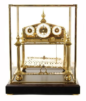 Appraisal: A gilt brass Congreve type rolling ball clock with a