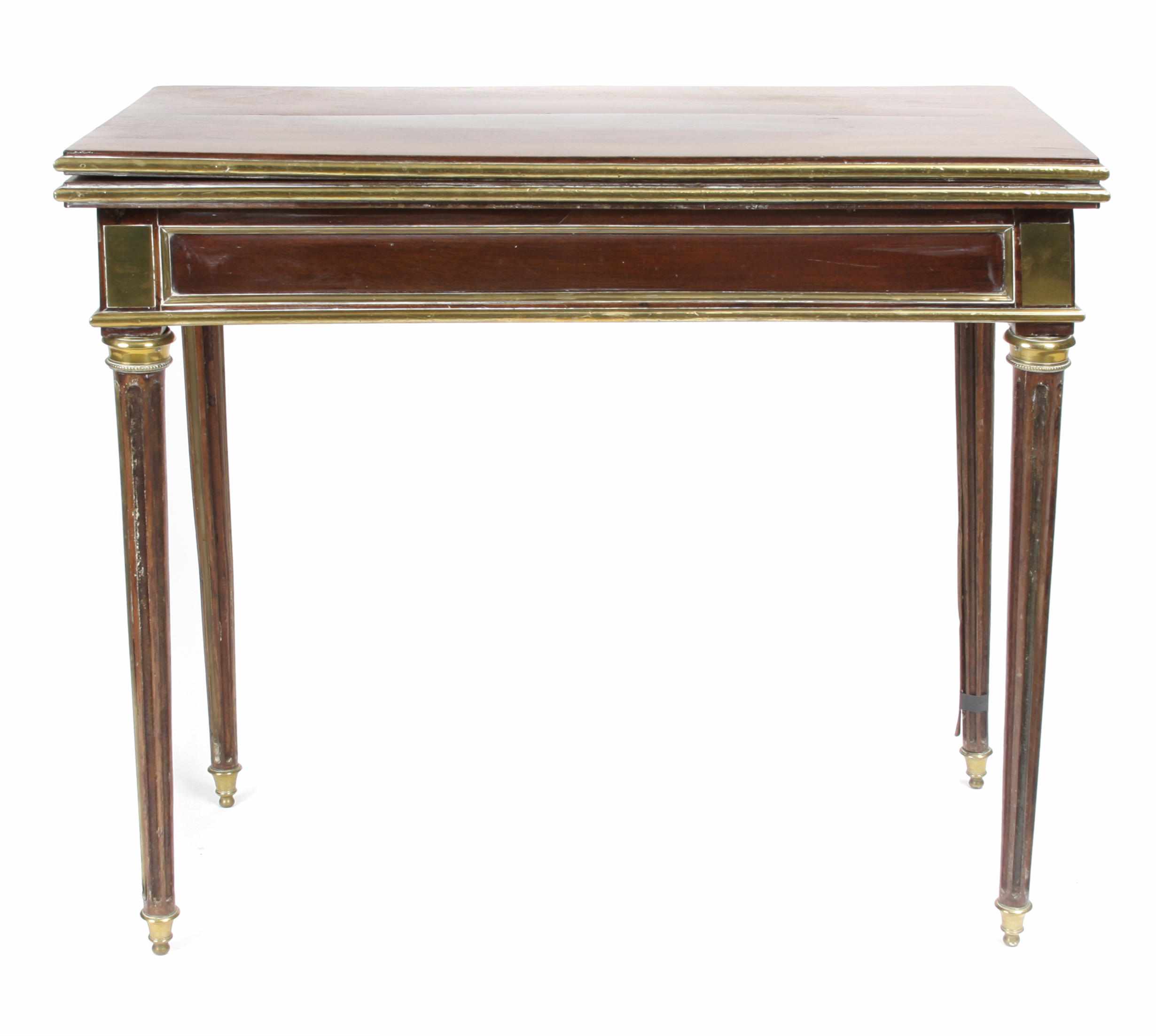 Appraisal: A Louis XVI brass mounted mahogany fold top games table