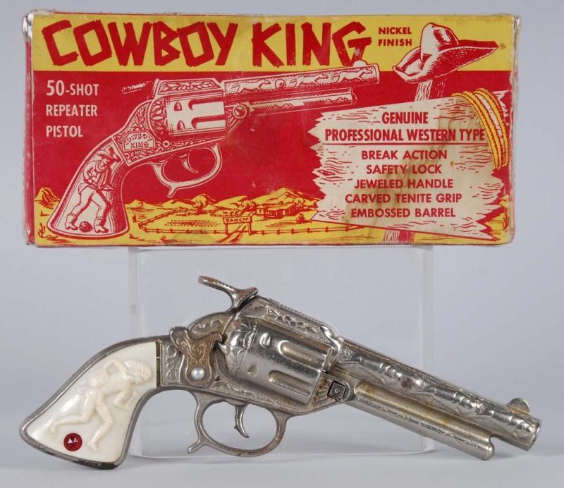 Appraisal: Cast Iron Cowboy King Cap Gun Description Includes box Box