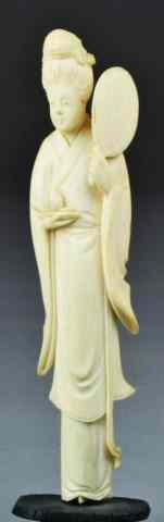 Appraisal: Chinese Carved Ivory Lady Holding PeachFinely carved figure of woman