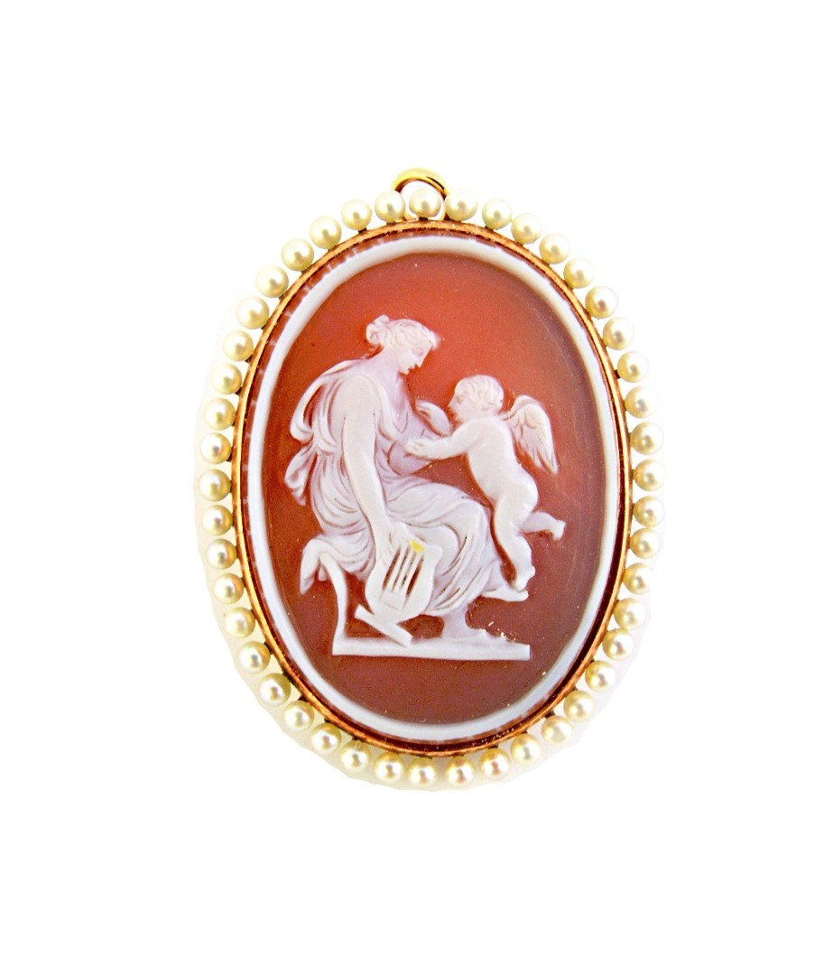 Appraisal: A gold carved sardonyx cameo and seed pearl set oval