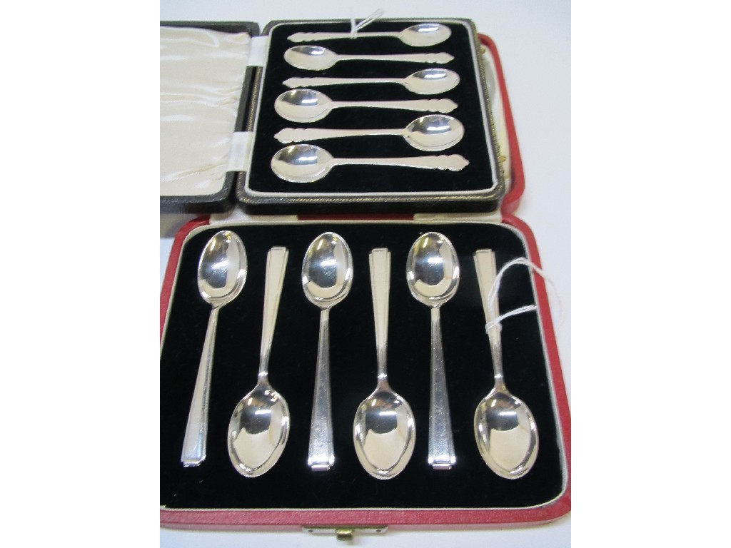 Appraisal: Lot comprising two cased sets of six silver spoons Birmingham