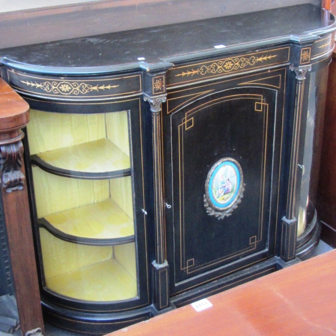 Appraisal: A Victorian gilt metal mounted marquetry and ceramic inlaid credenza