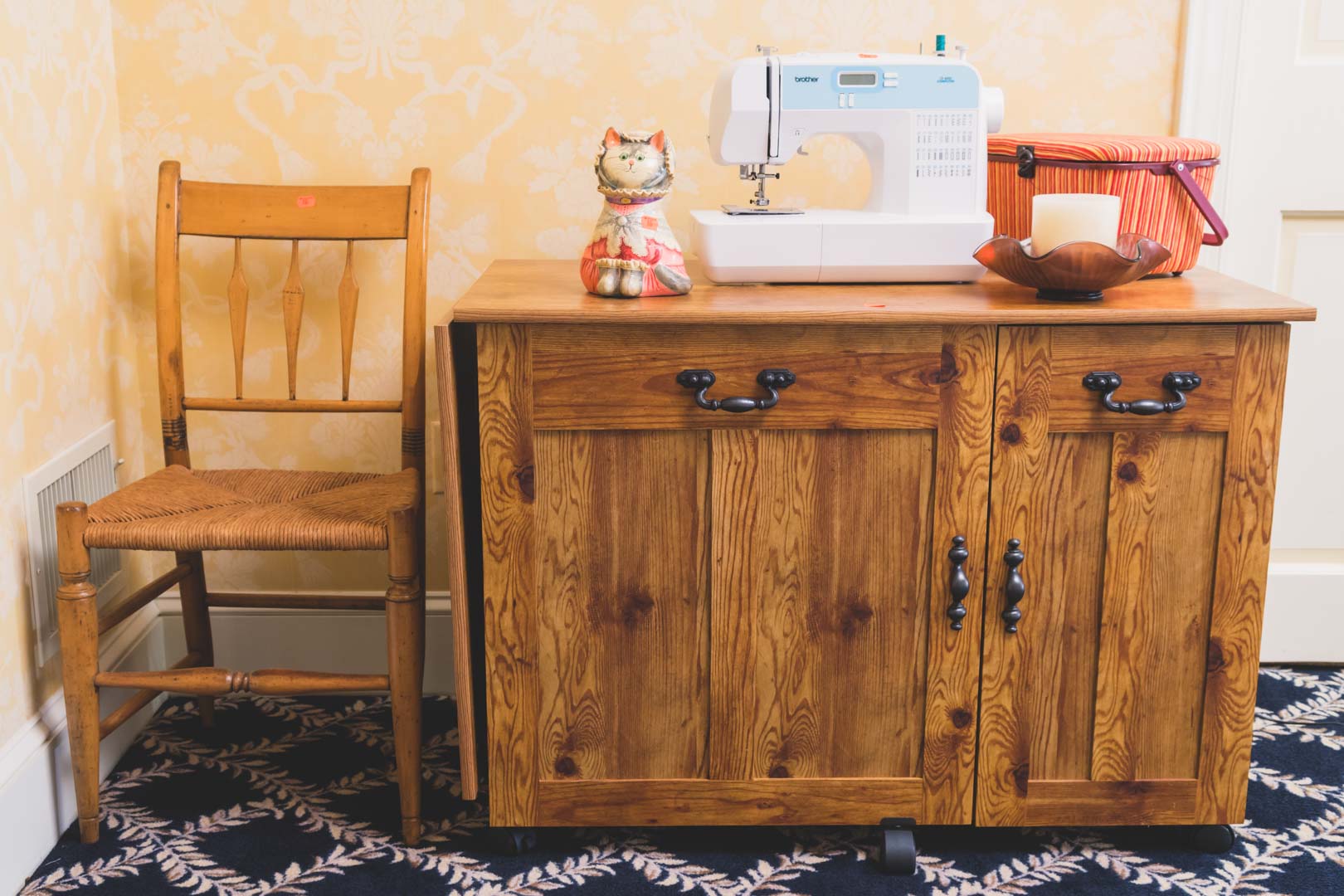 Appraisal: Pine sewing cabinet together with Old Brother sewing machine and