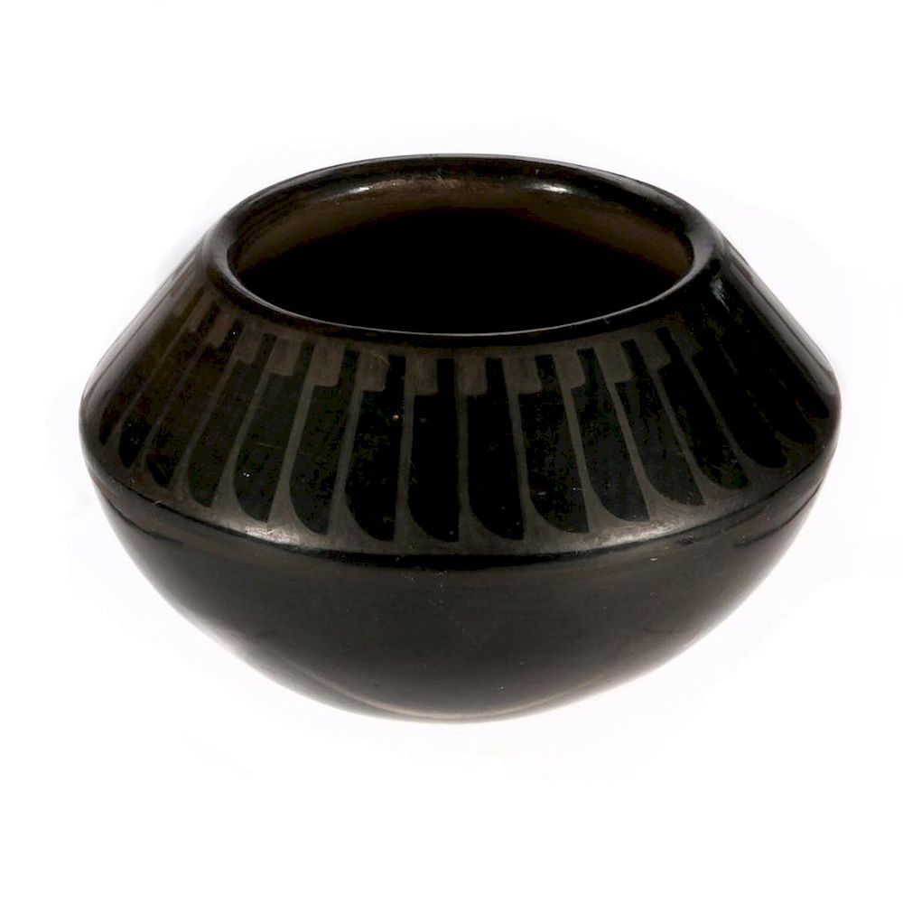 Appraisal: A San Ildefonso Blackware Jar Blue Corn Height in Diameter