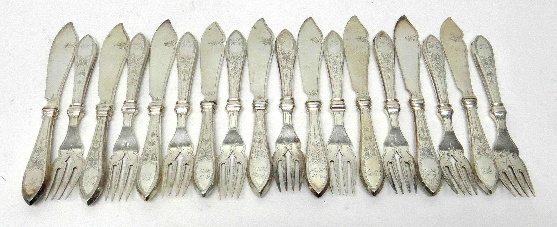 Appraisal: Nine pairs of Danish fish knives and forks the blades