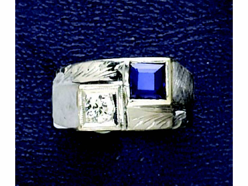 Appraisal: DIAMOND AND SAPPHIRE RING k white gold ring with geometric