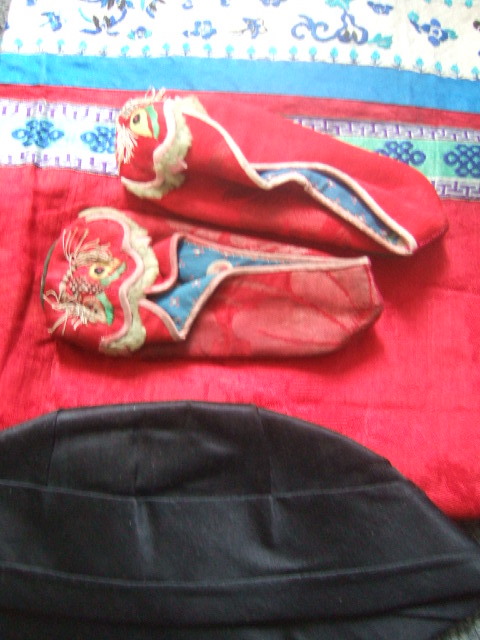 Appraisal: A Chinese child's two-piece silk costume dated with black silk