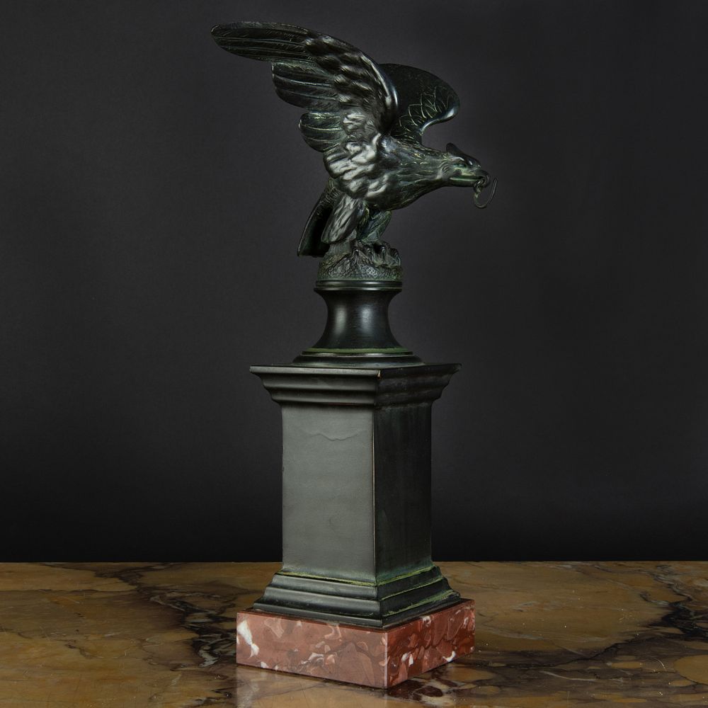 Appraisal: Bronze and Marble Eagle-Form Watch Stand Raised on a marble