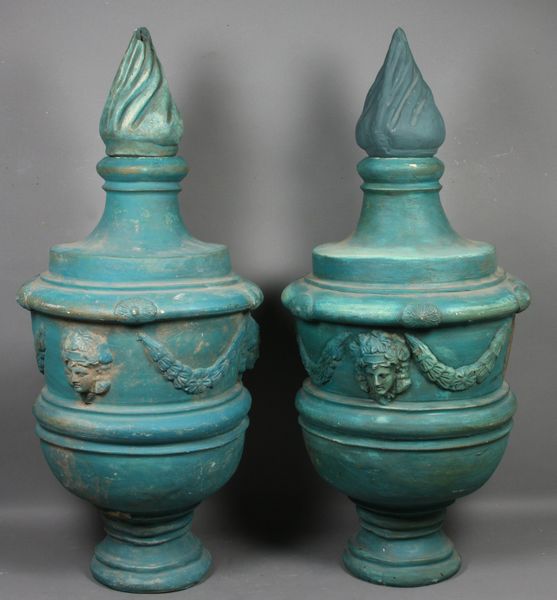 Appraisal: Pair of mid th Century blue painted terra cotta urns