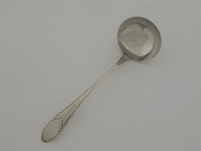 Appraisal: Cork A George III Irish provincial sauce ladle with a