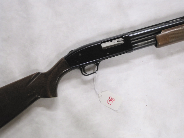 Appraisal: MOSSBERG MODEL AT SLIDE ACTION SHOTGUN gauge or modified choke