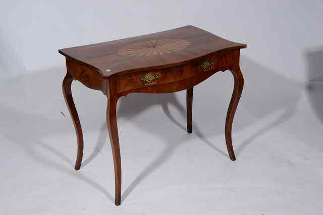 Appraisal: A GEORGE III MAHOGANY SIDE TABLE of serpentine outline the