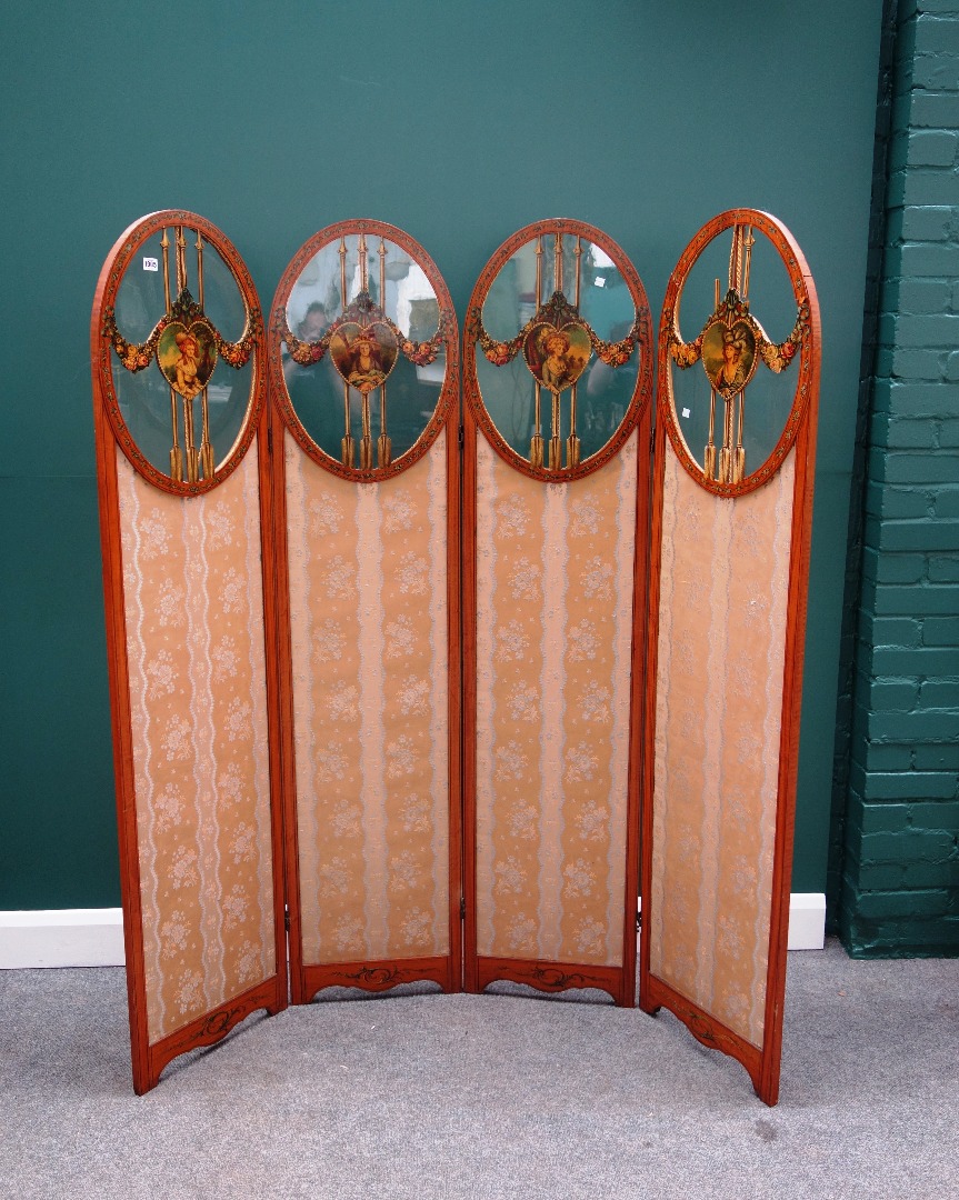 Appraisal: A late th century painted satinwood four-fold arch top semi-glazed