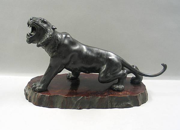 Appraisal: A small bronze figure of a stalking tiger Taisho Showa