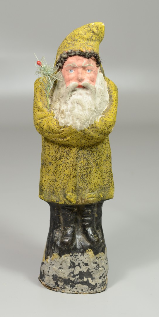 Appraisal: Paper mache Santa candy container yellow robe with mica flecks