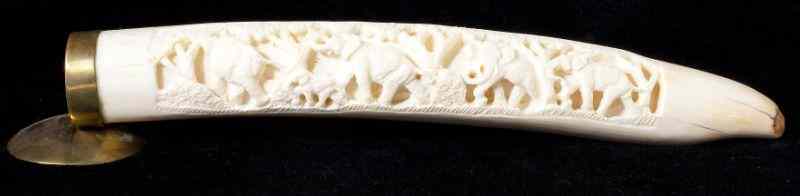 Appraisal: Chinese Ivory Tusk Carved with Elephantsmounted in a brass cuff