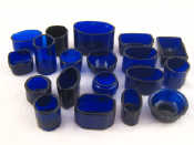 Appraisal: About eighteen various blue glass condiment pot liners