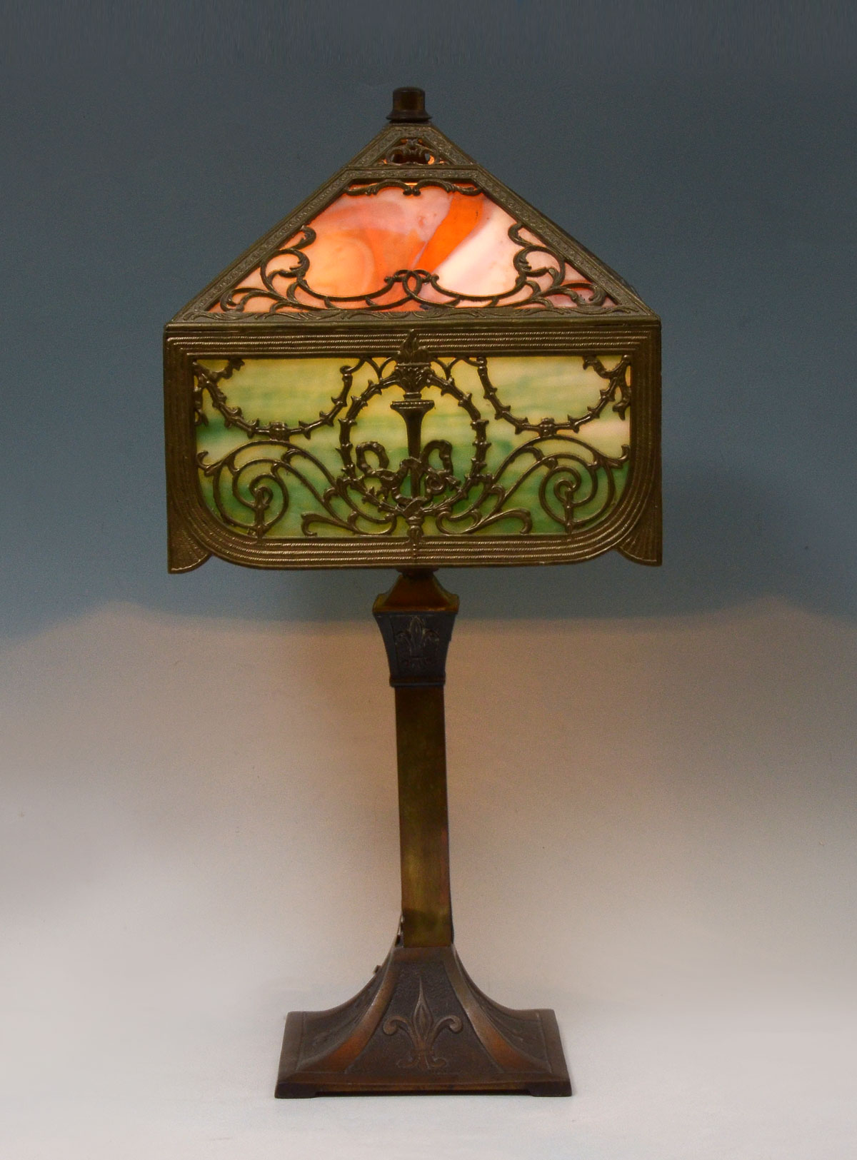 Appraisal: ART NOUVEAU FILIGREE SLAG GLASS LAMP Art nouveau single light