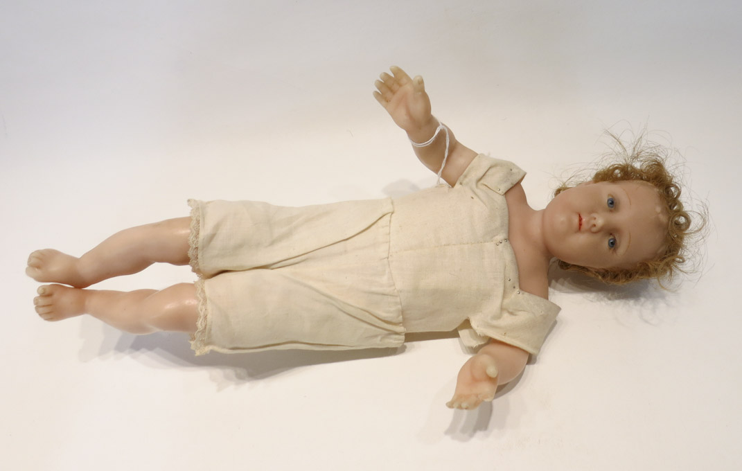 Appraisal: BABY JESUS WAX SHOULDER HEAD DOLL with blond hair blue