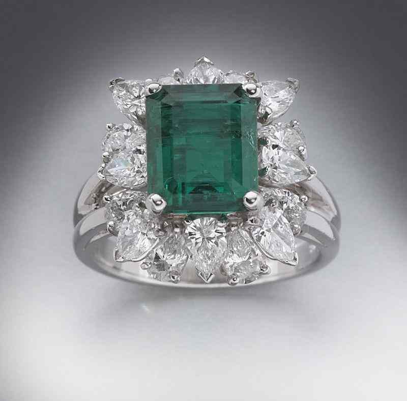 Appraisal: Oscar Heyman emerald and diamond ring the central emerald cut