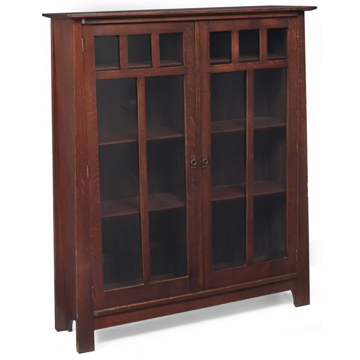 Appraisal: Arts and Crafts bookcase in the manner of Limbert canted