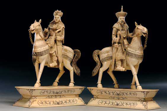 Appraisal: PAIR CARVED IVORY EQUESTRIANS Pair of Chinese carved ivory equestrians