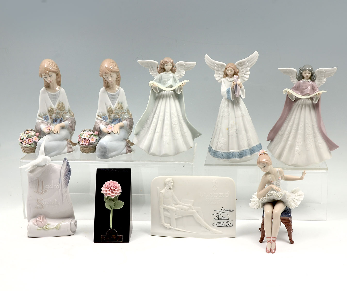 Appraisal: PIECE LLADRO COLLECTION Angel with pink robe and music banner