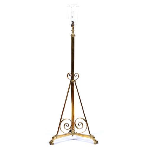 Appraisal: An Edwardian telescopic brass oil lamp standard converted to electricity