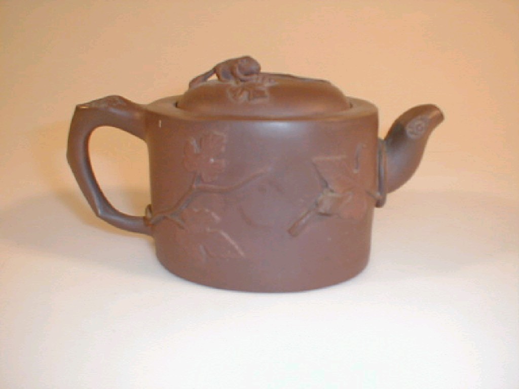 Appraisal: A late thC Chinese Yi Hsing red earthenware teapot modelled